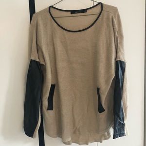 Tan sweater with leather accents
